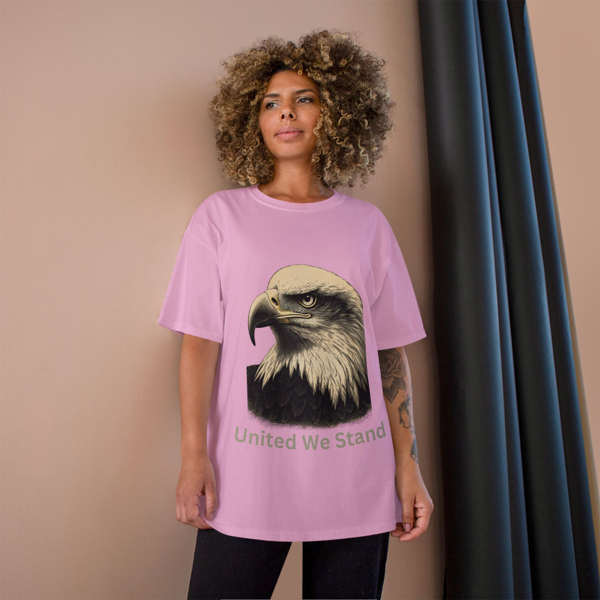 Engraved Eagle - United We Stand - text on the bottom of a Champion Tee