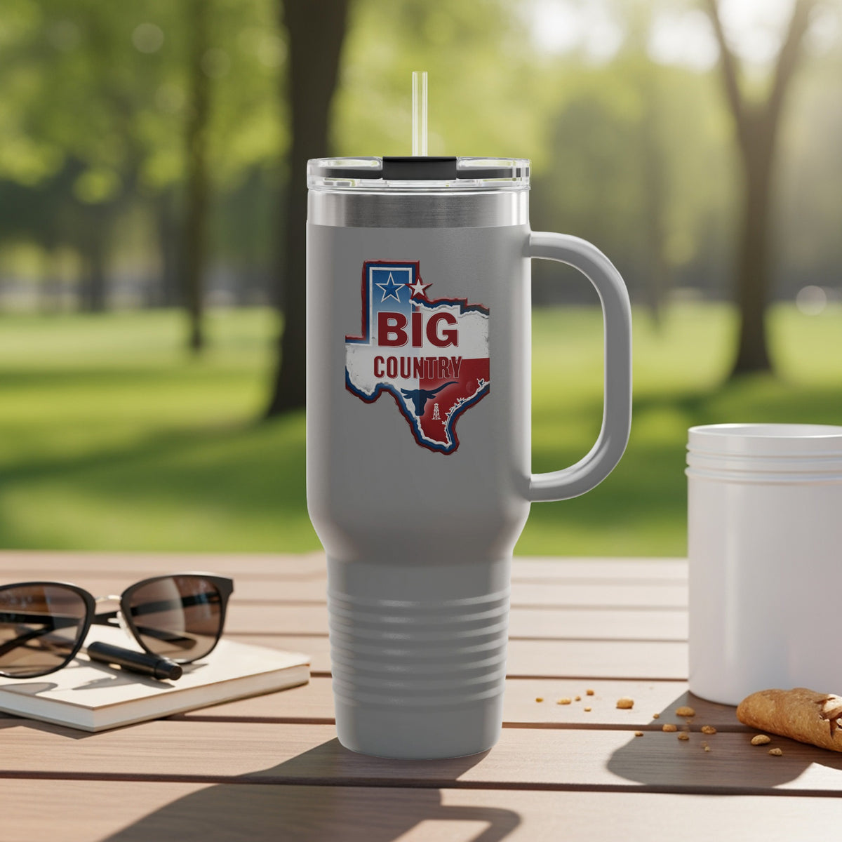 Texas-shaped tumbler with "Big Country" text and a USA flag design.