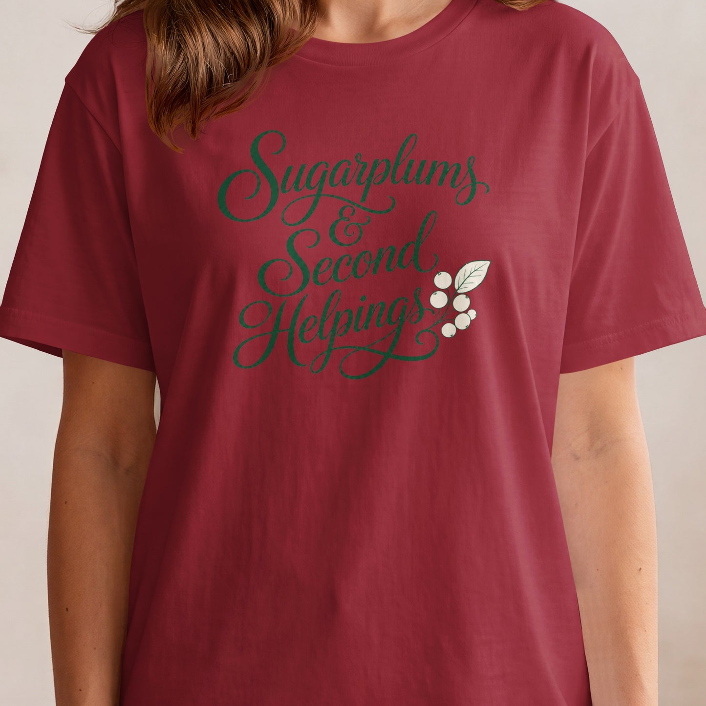 Maroon t-shirt with green script text "Sugarplums & Second Helpings" and berries.