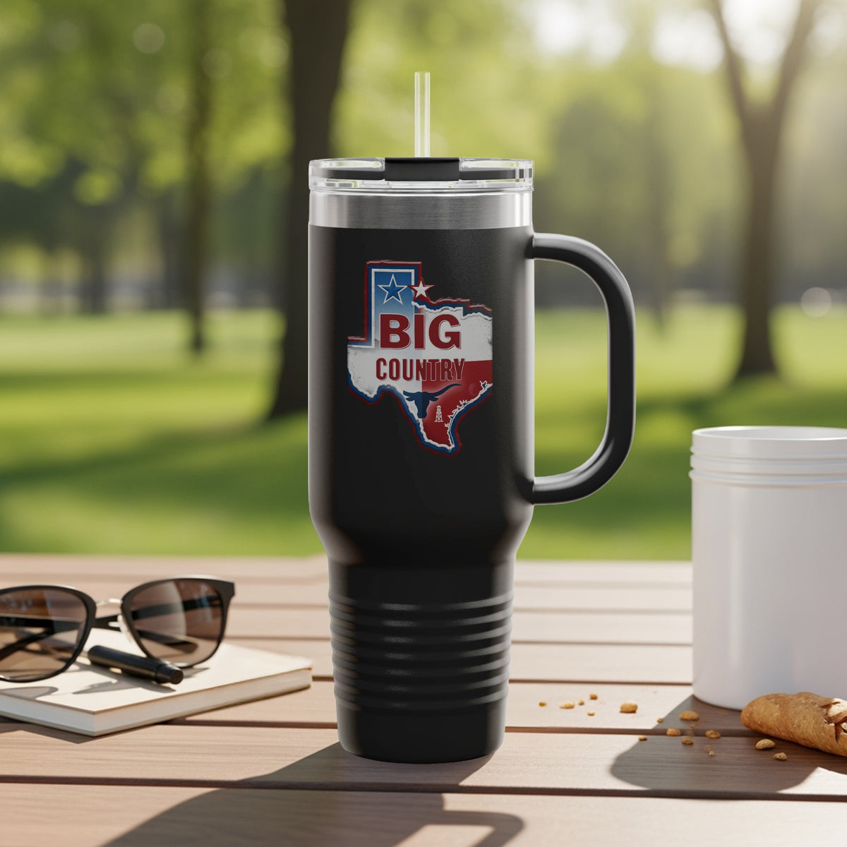 Travel mug with Texas outline and text.