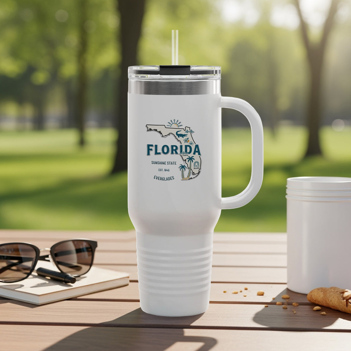 White travel tumbler with "Florida Sunshine State" logo and palm trees.