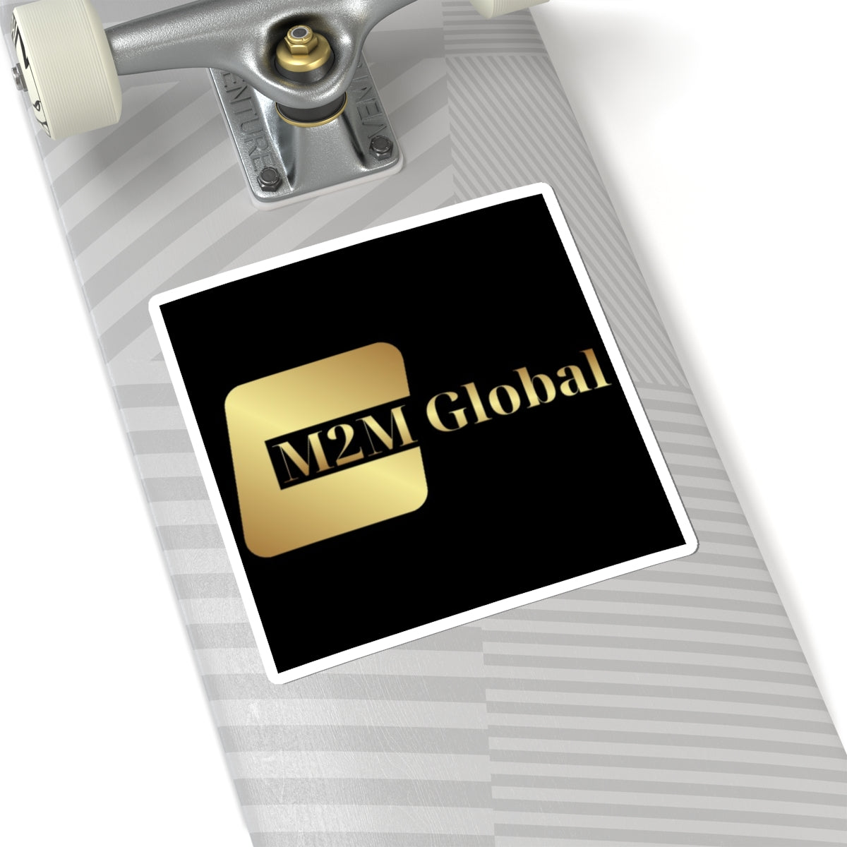 Gold 'M2M Global' logo on a gray background
