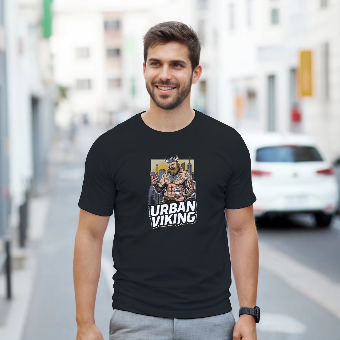 Person wearing a gray t-shirt with 'Urban Viking' graphic design in an indoor setting