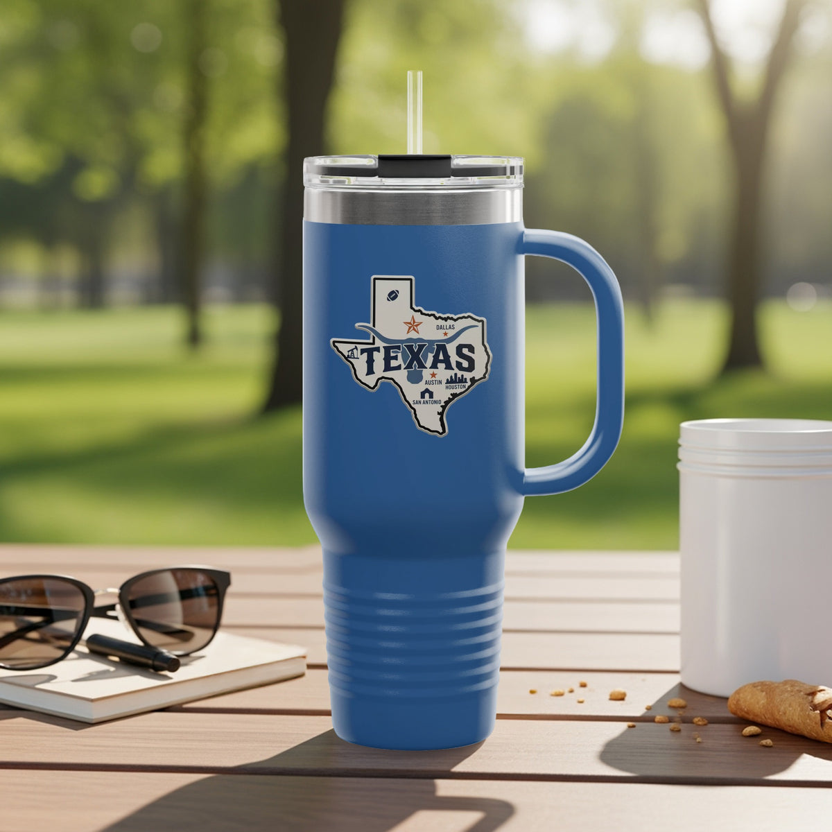 Travel mug with Texas outline and text.