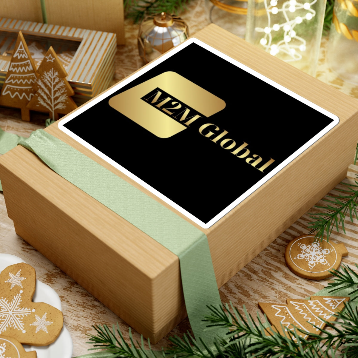 Gold 'M2M Global' logo on a gray background