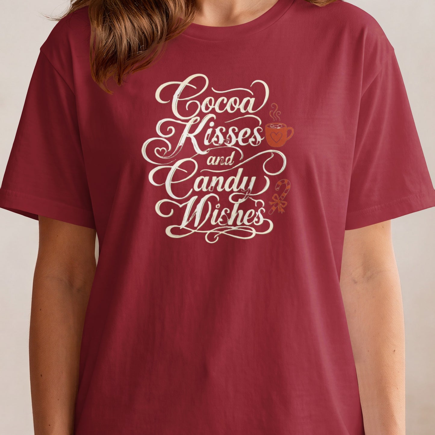 Red t-shirt with "Cocoa Kisses and Candy Wishes" text, hot cocoa, and candy cane graphic.