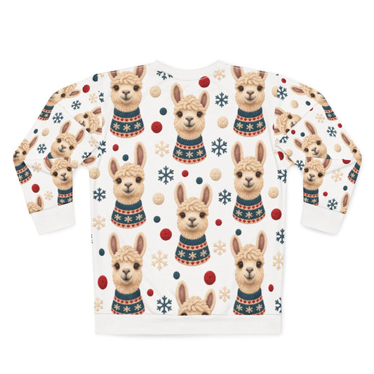 White sweatshirt with a pattern of llamas wearing sweaters and snowflakes.