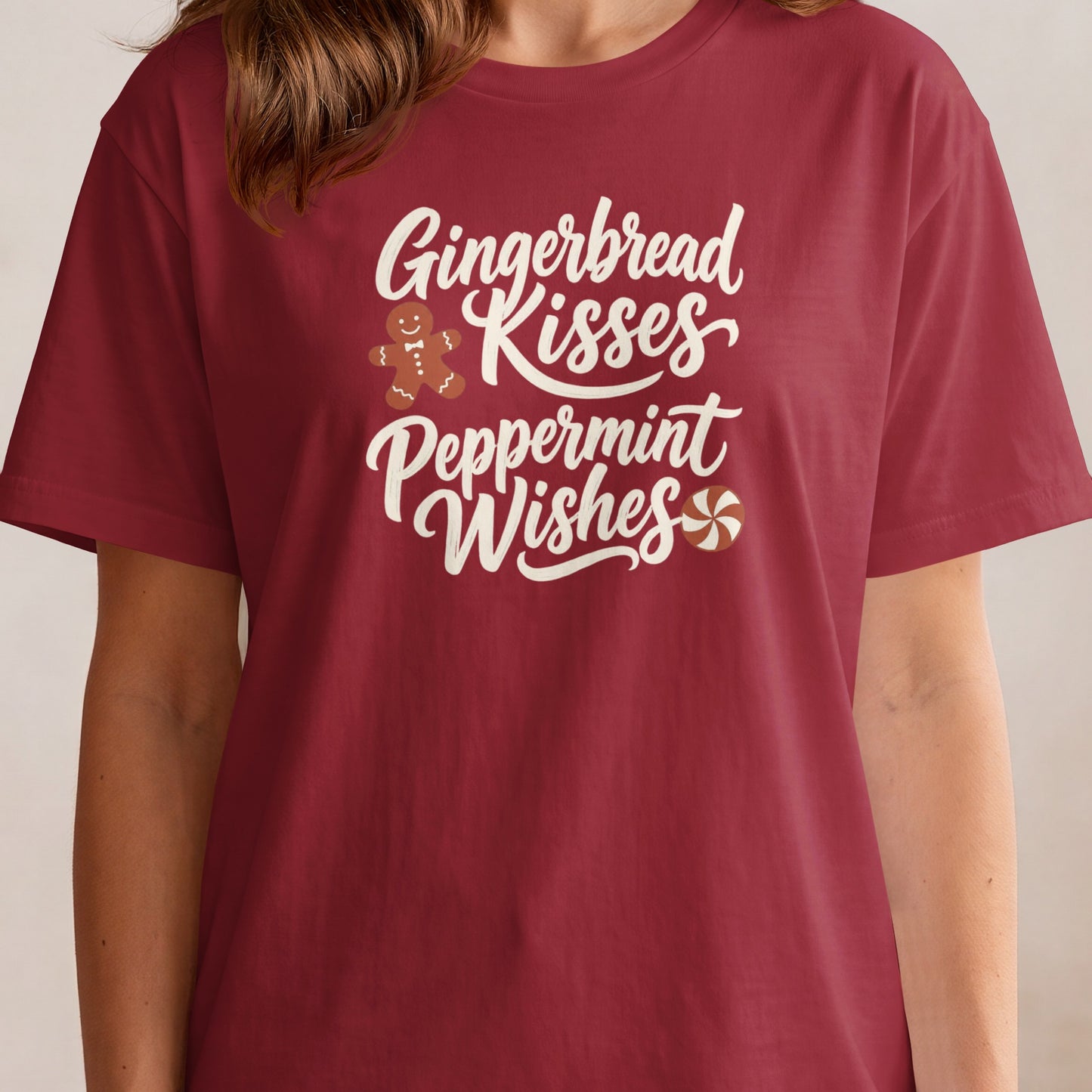 Maroon t-shirt with "Gingerbread Kisses Peppermint Wishes" text and graphics.