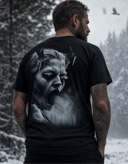 A man viewed from behind wearing a black graphic t-shirt with a large grayscale print of a screaming face on the back, set against a snowy forest background.