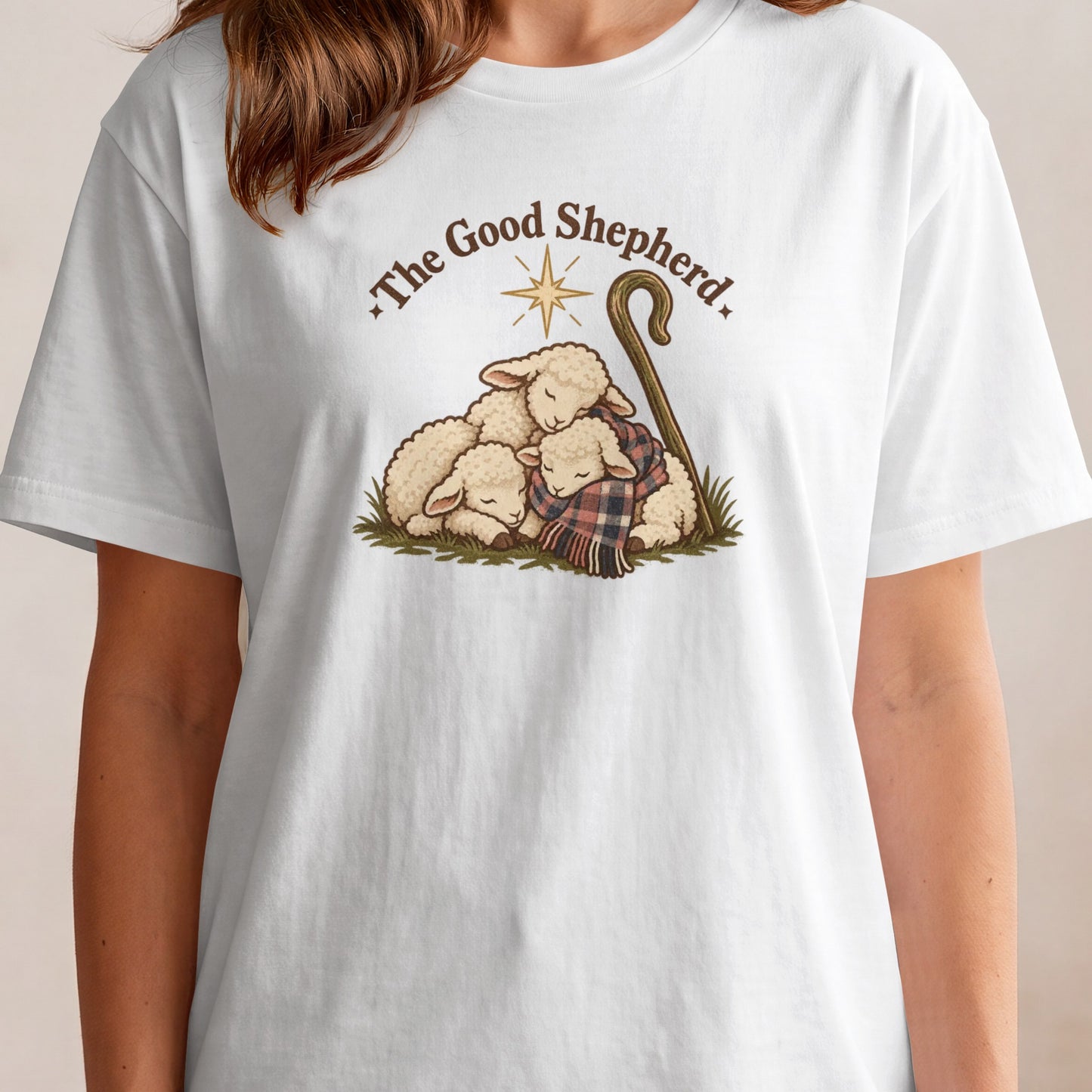 Three sheep nestled together with a shepherd's crook and star, text "The Good Shepherd."