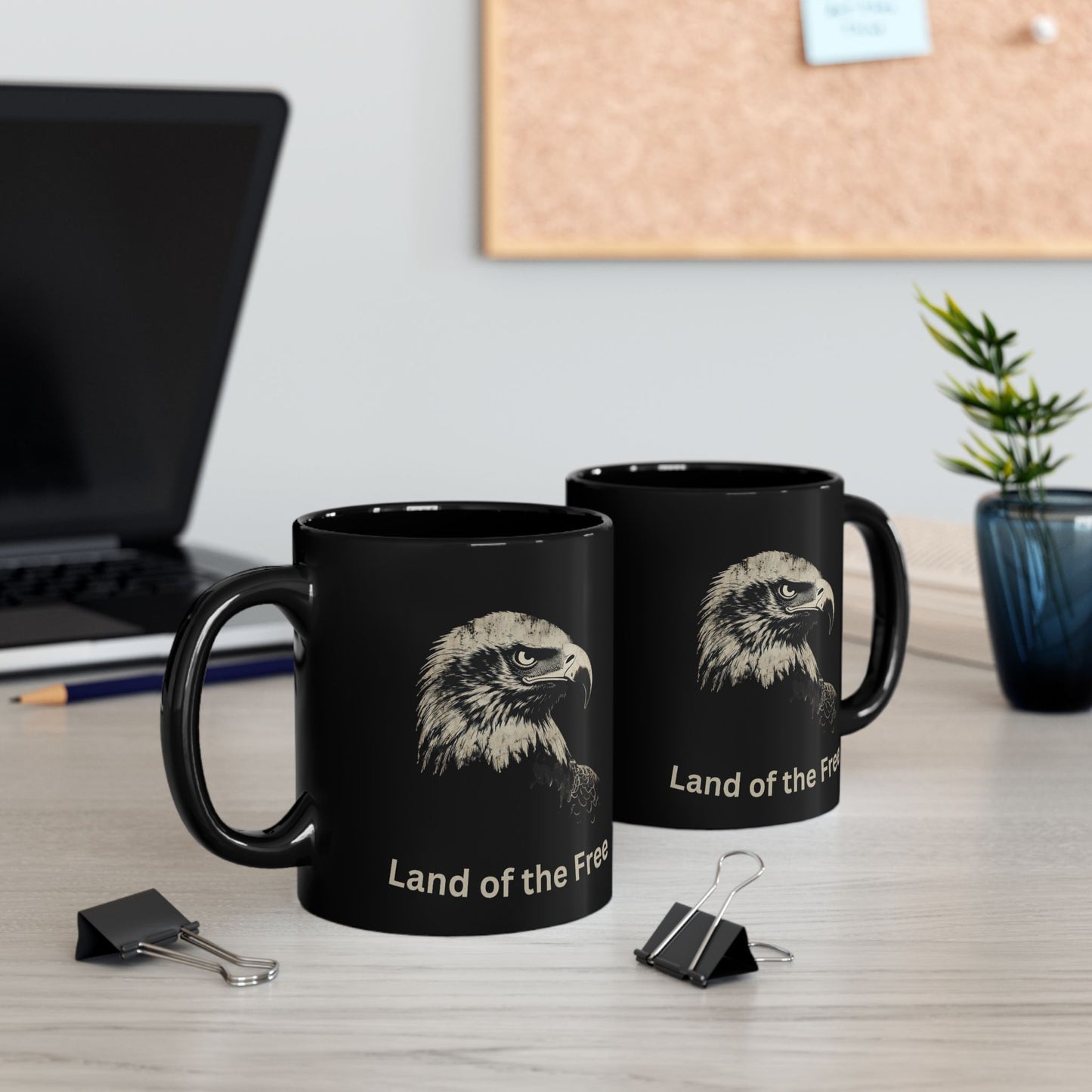Black mug with eagle graphic and "Land of the Free" text.