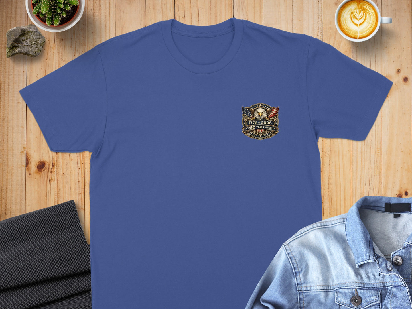 Blue t-shirt with American eagle emblem and "1776-2026 250 Years" text.