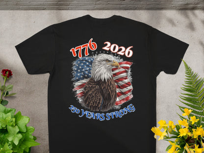 Black t-shirt with bald eagle, US flag, and "1776 2026 250 YEARS STRONG" text.