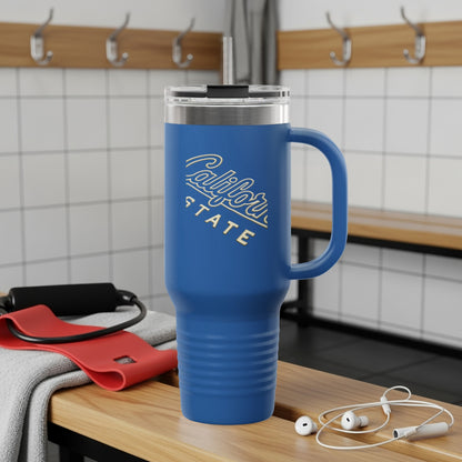 Blue insulated tumbler with "California State" logo and straw, on a wooden bench.