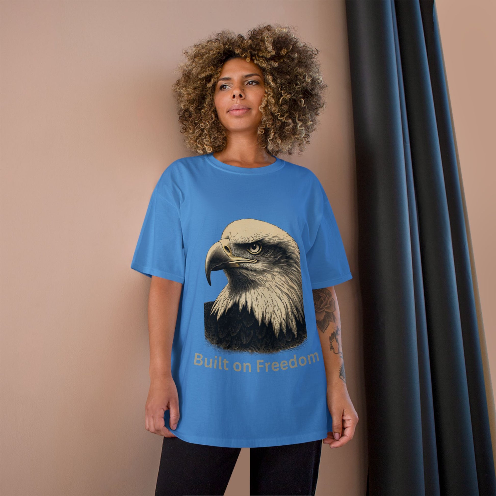 Engraved Eagle - Built of Freedom - text on the bottom of a Champion Tee
