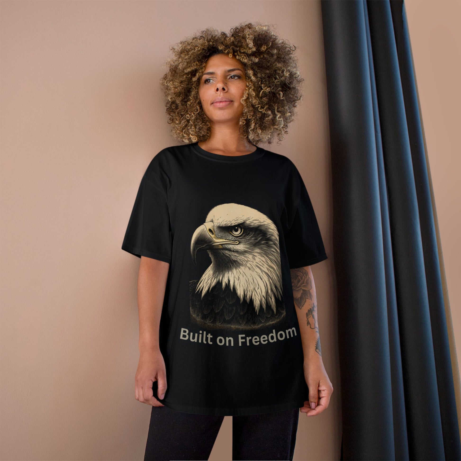 Engraved Eagle - Built of Freedom - text on the bottom of a Champion Tee