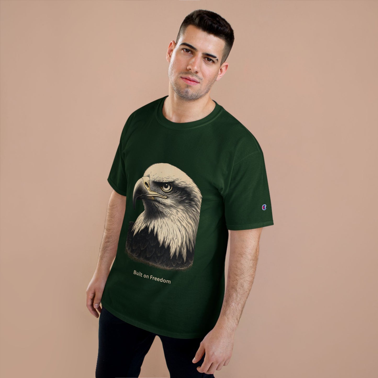Engraved Eagle - Built for Strength - text on the muted of a Champion Tee