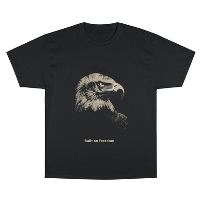 Built on Freedom small font text below an eagle head on a Champion Tee