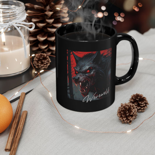 Black mug with werewolf design on a table with decorative items