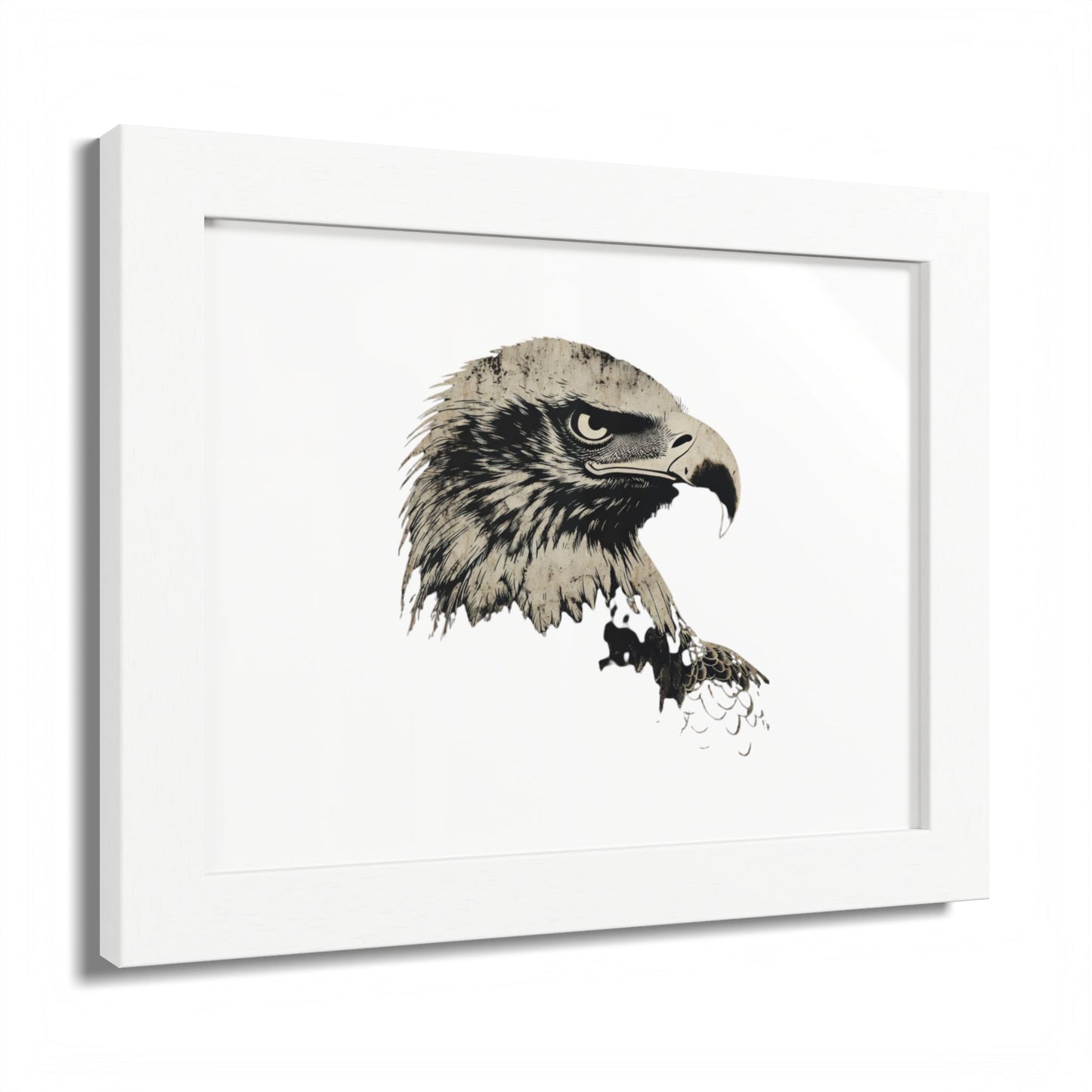 Framed artwork of a detailed eagle's head in profile.