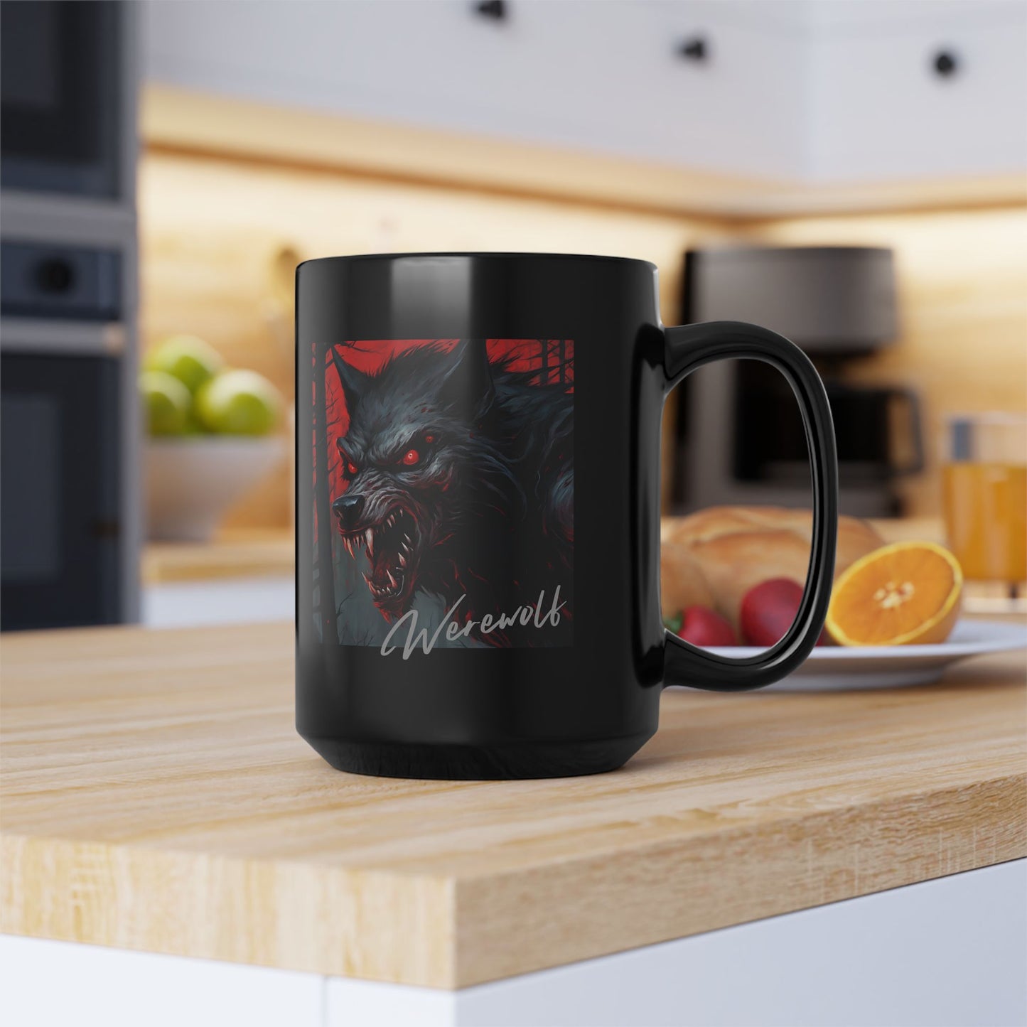 Black mug with a werewolf design on a kitchen counter