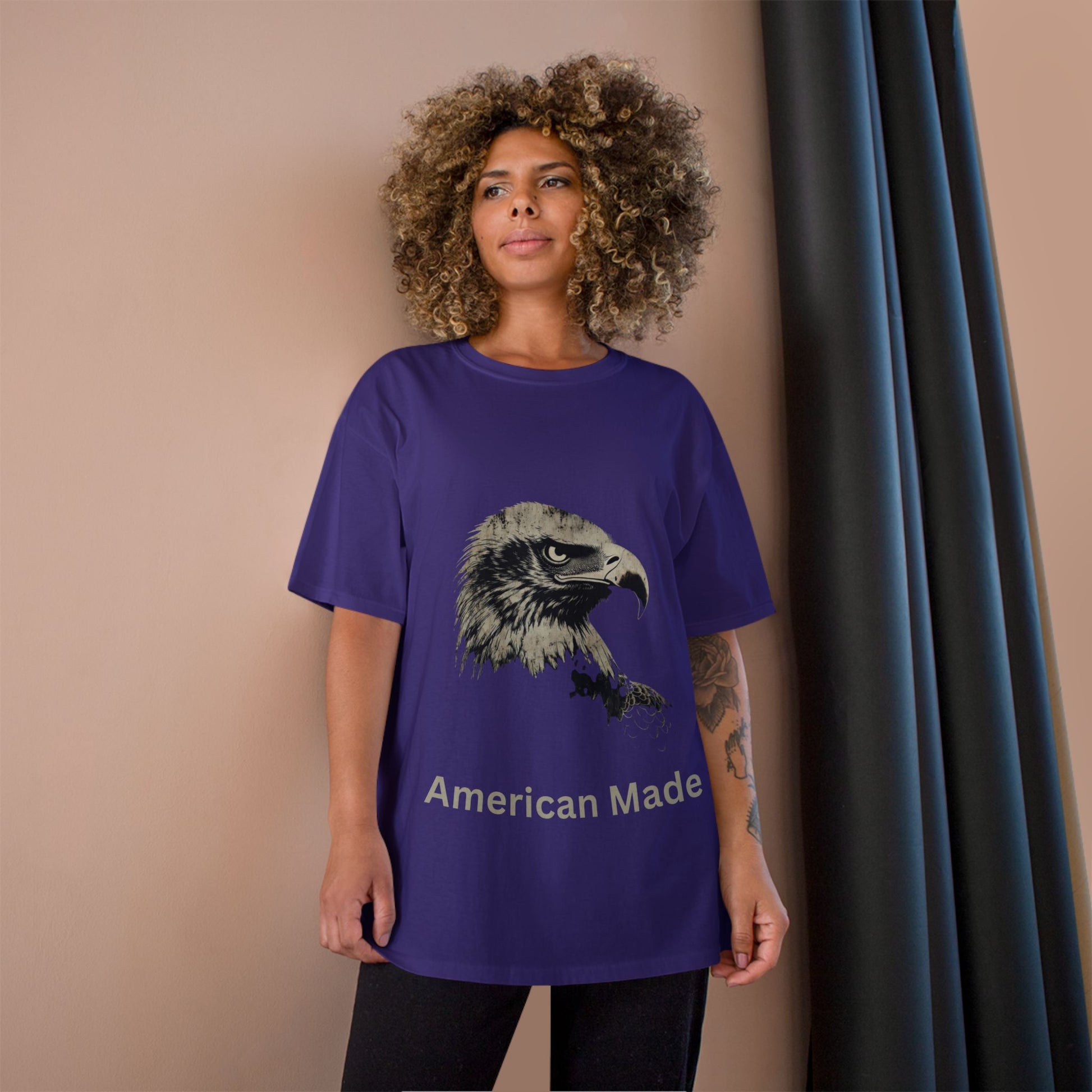 American Made text below an eagle head on a Champion Tee