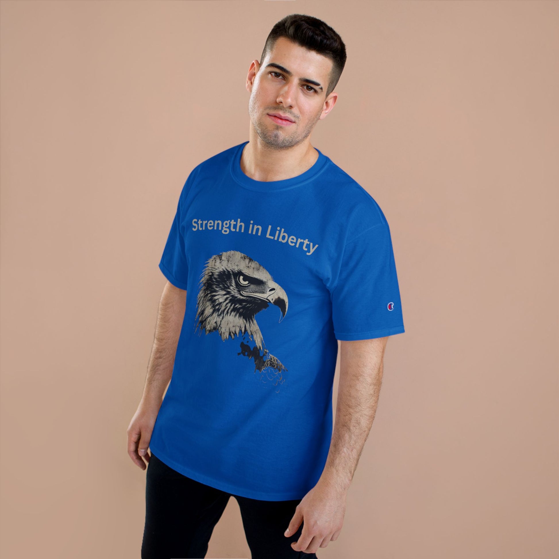 Strength in Liberty text above an eagle head on a Champion Tee