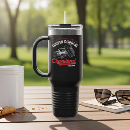 Black travel tumbler with Cooper Disposal logo, dump truck graphic, and Cleveland text.