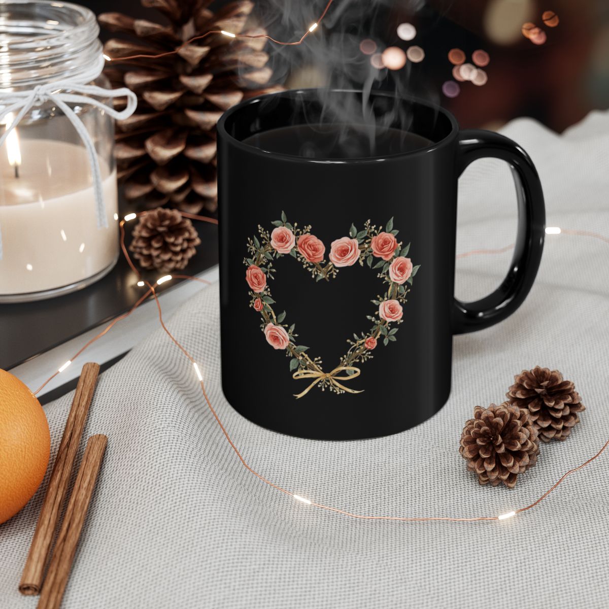 Black Mug Featuring Heart-Shaped Floral Design