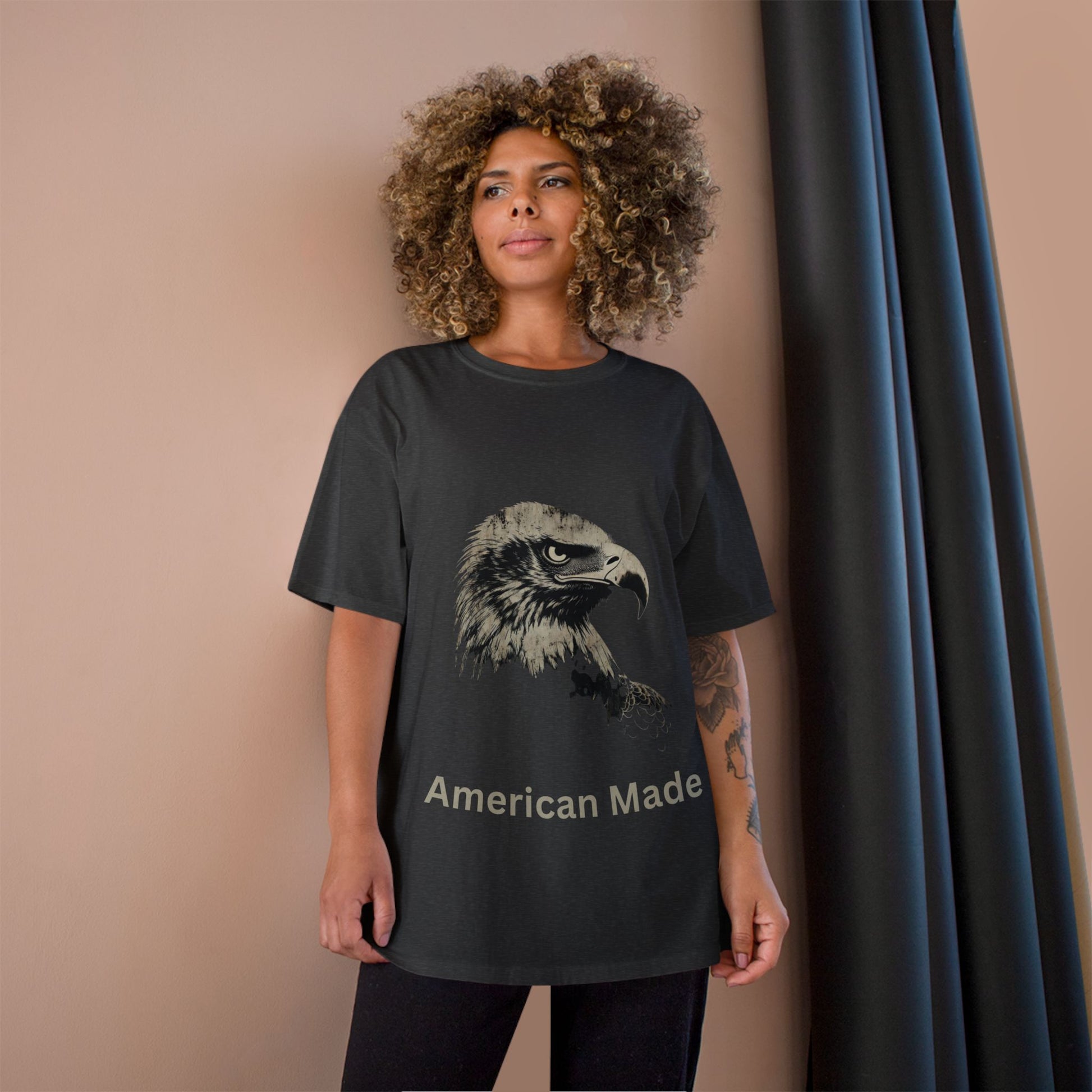 American Made text below an eagle head on a Champion Tee