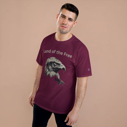 Land of the Free text above an eagle head on a Champion Tee