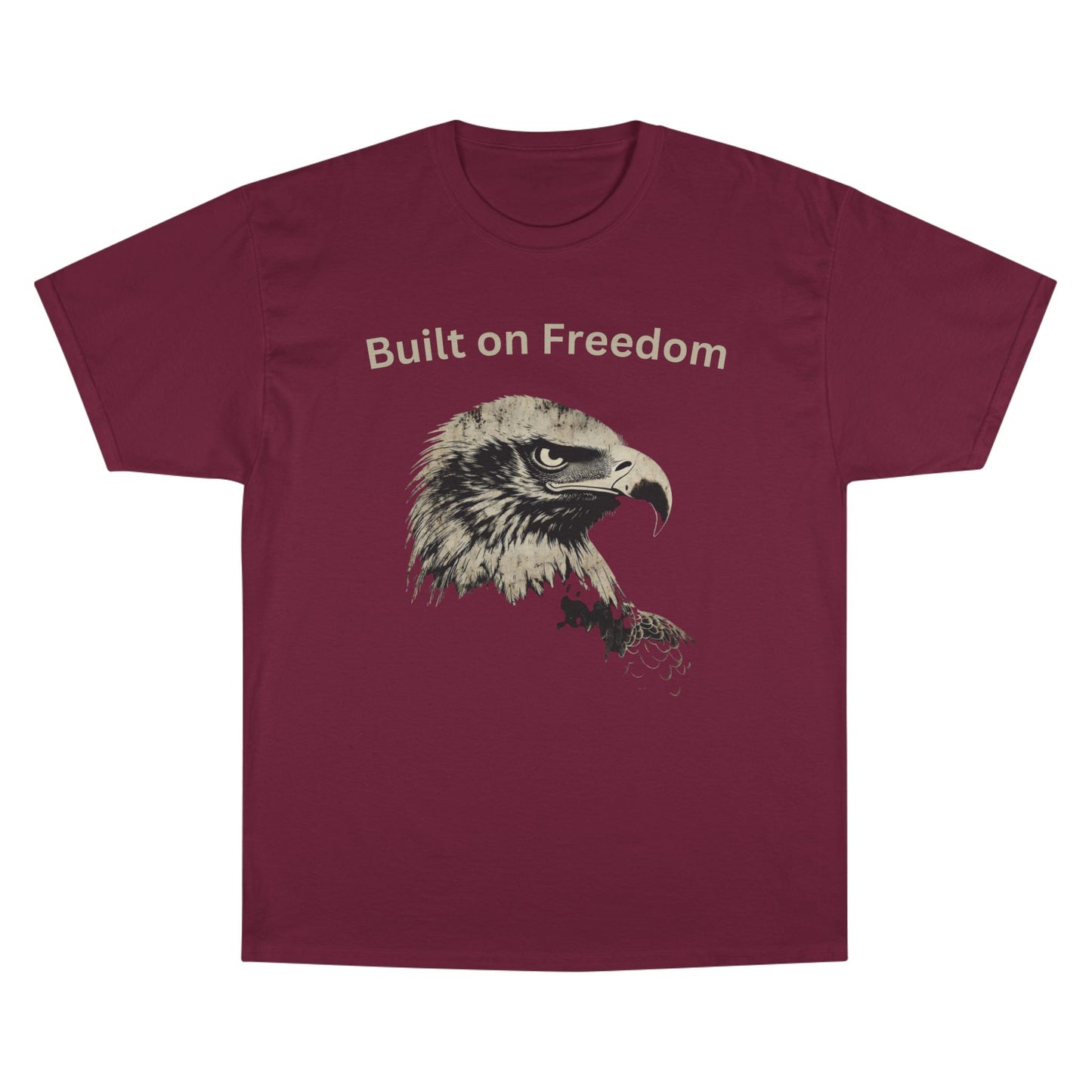 Built on Freedom text above an eagle head on a Champion Tee