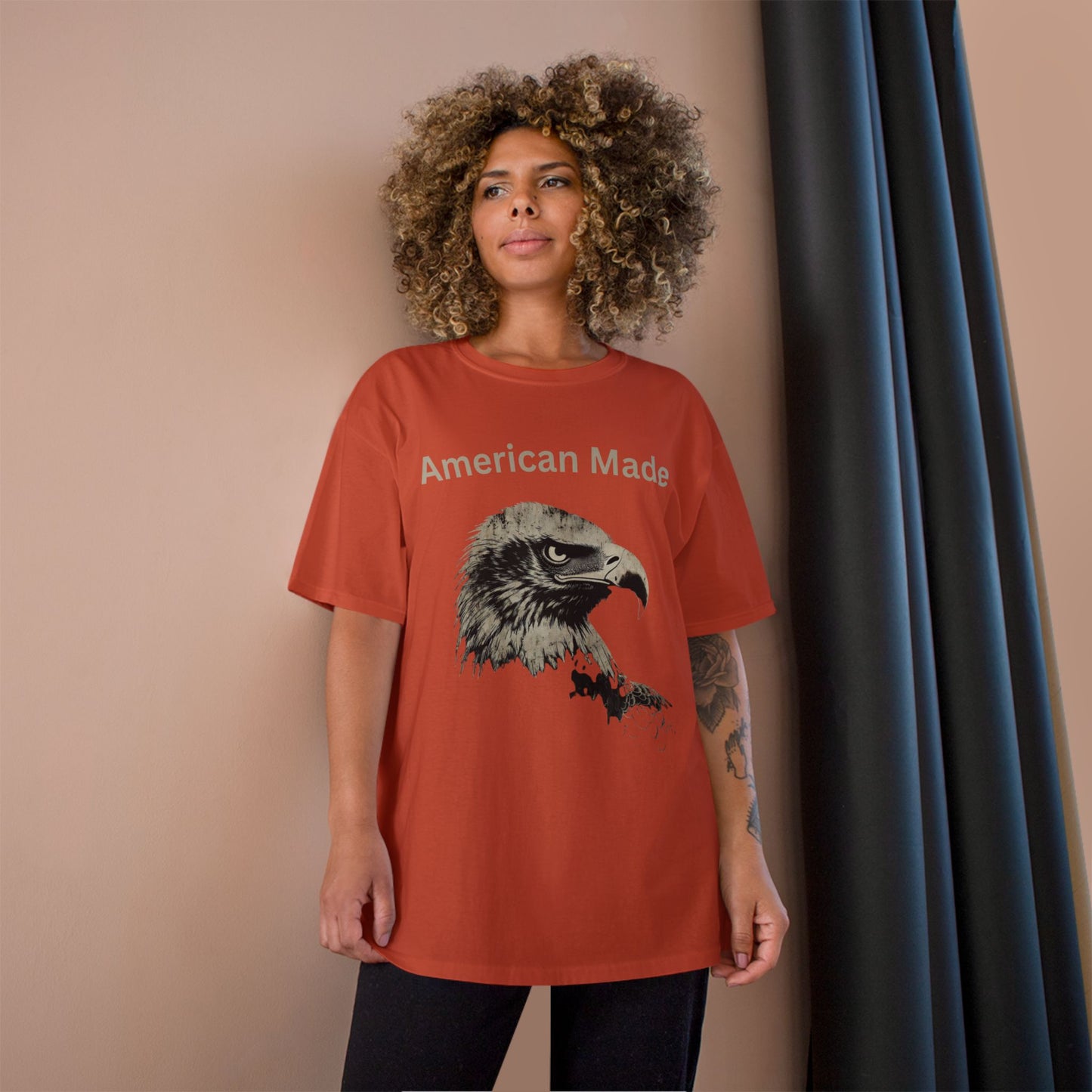 American Made text above an eagle head on a Champion Tee