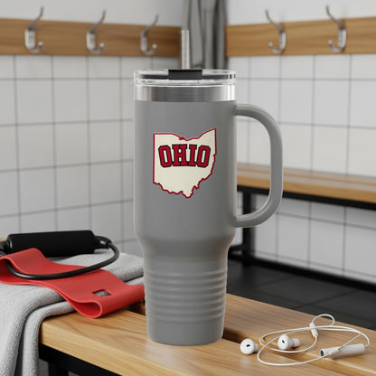 Gray tumbler with Ohio map graphic and handle, on locker room bench.
