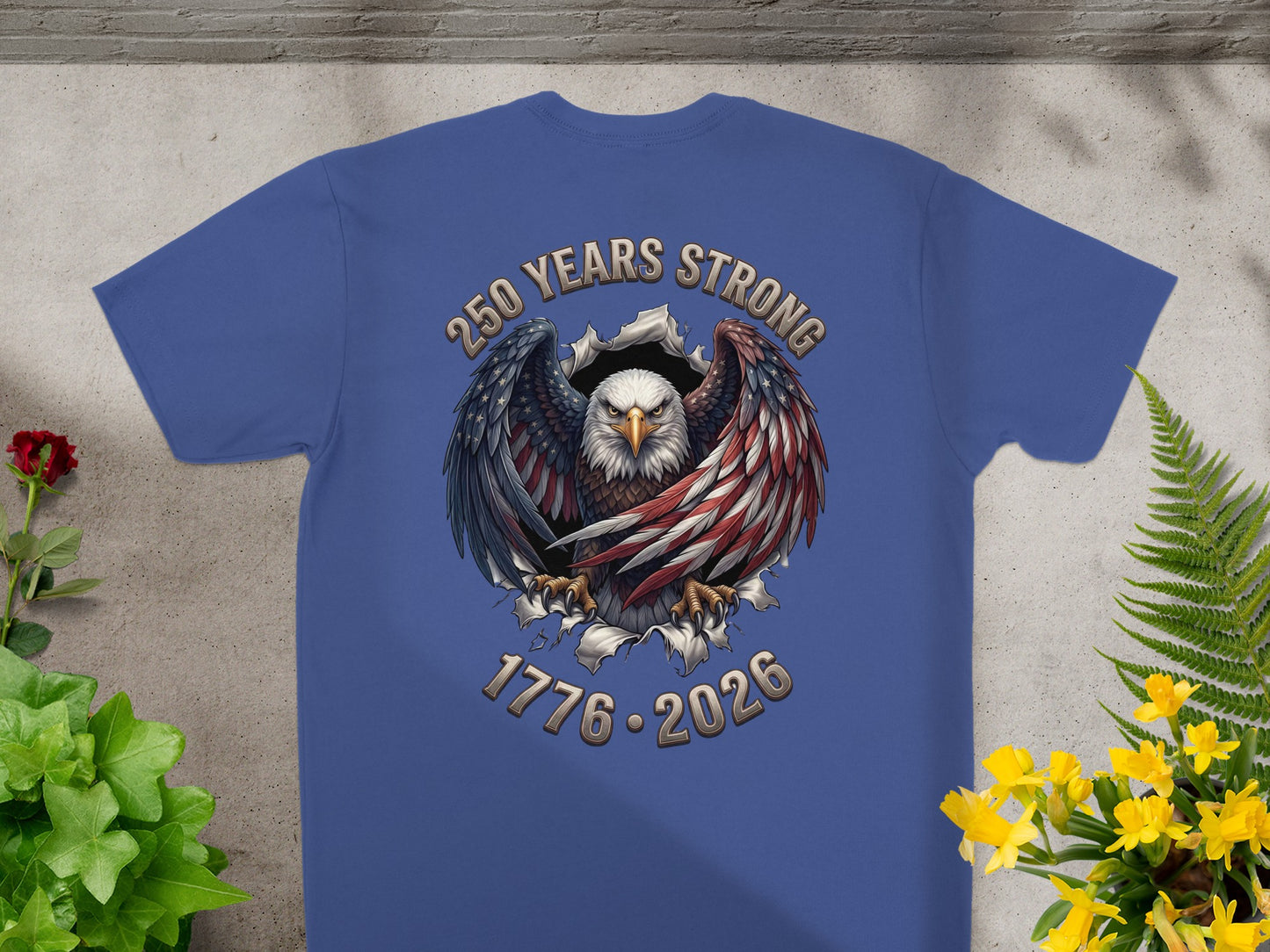 Blue t-shirt with eagle and patriotic text "250 Years Strong 1776-2026".