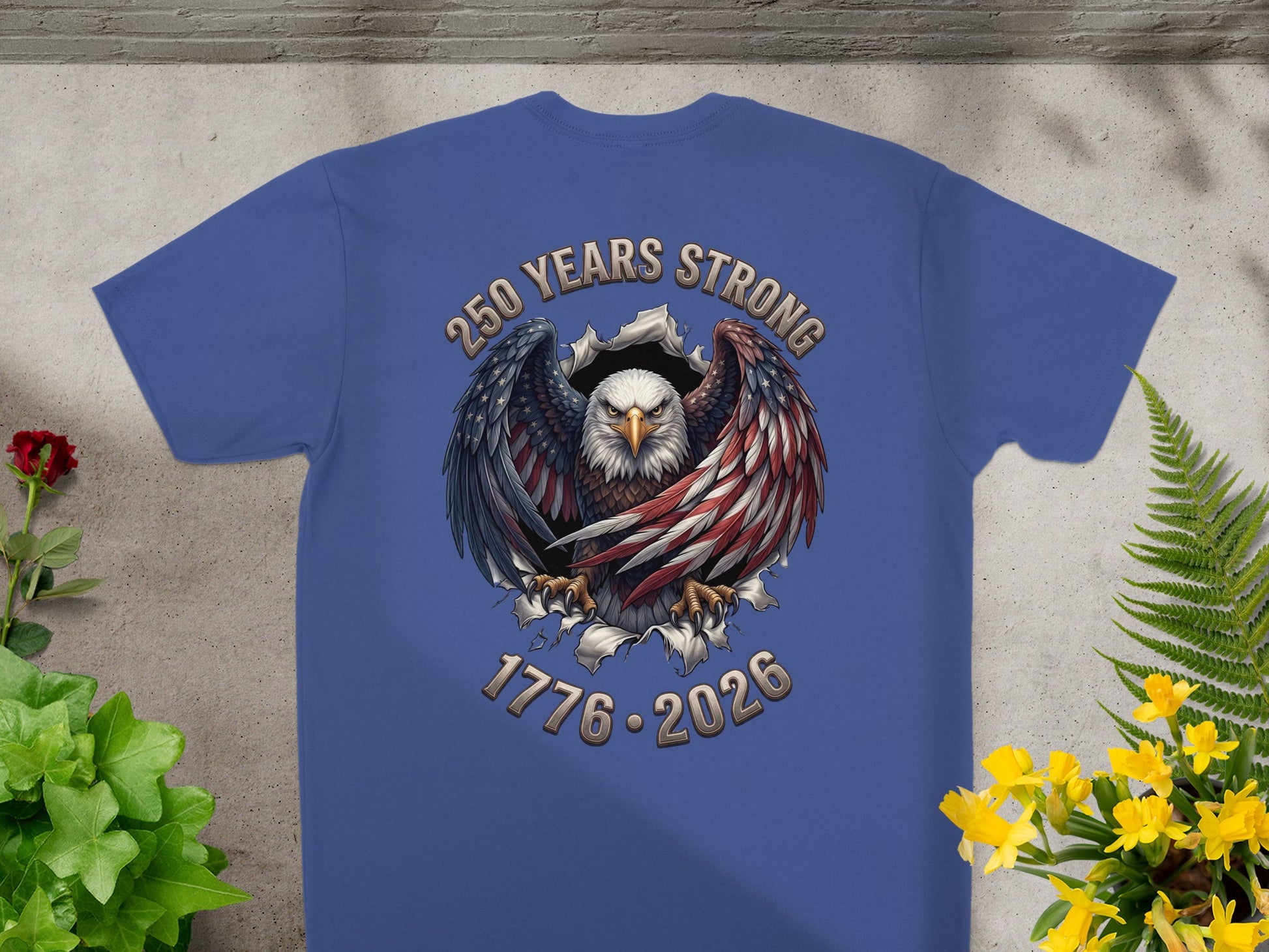 Blue t-shirt with eagle and patriotic text "250 Years Strong 1776-2026".
