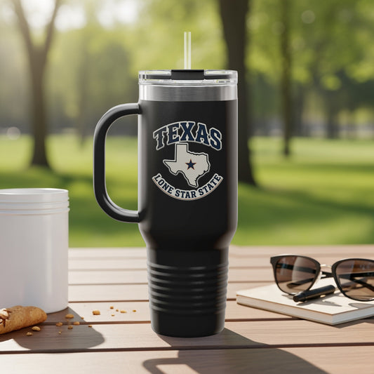 Travel mug with Texas outline and text.