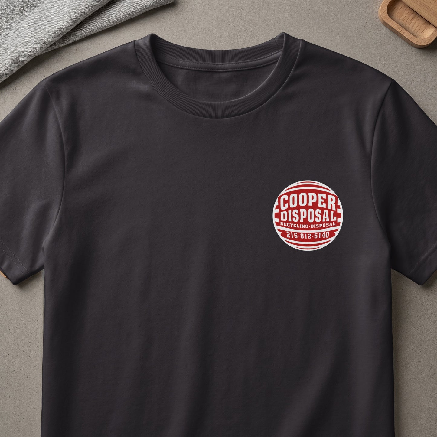 Dark gray t-shirt with "Cooper Disposal Recycling Disposal 216-512-5140" logo.