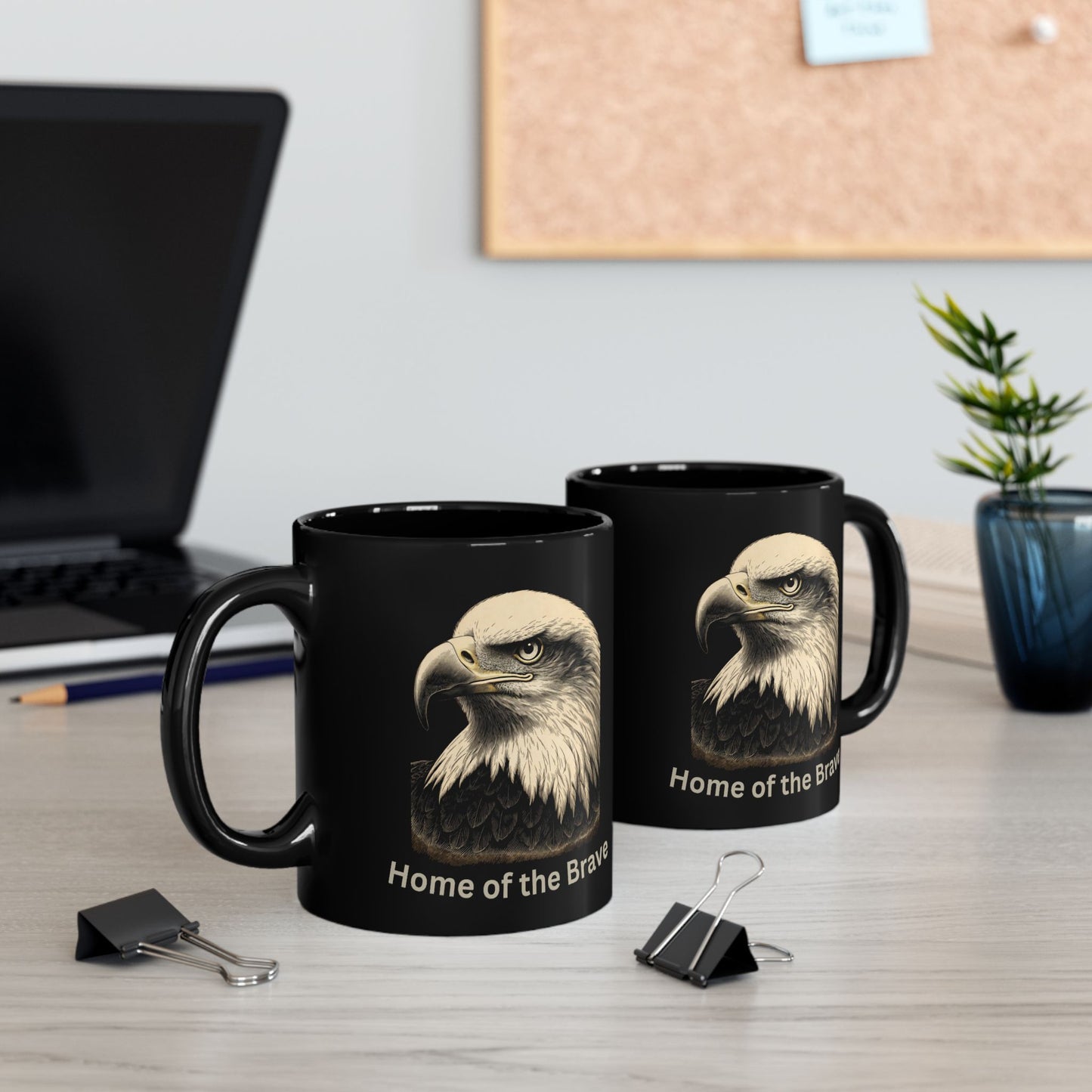 Two black mugs featuring a bald eagle and "Home of the Brave" text.
