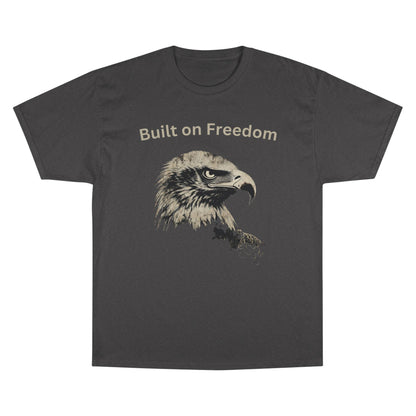 Built on Freedom text above an eagle head on a Champion Tee