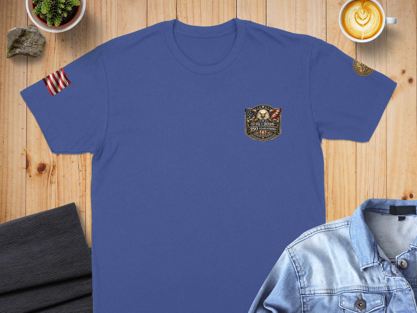 Blue t-shirt with American flag, eagle, and "1776-2026" text on the chest.