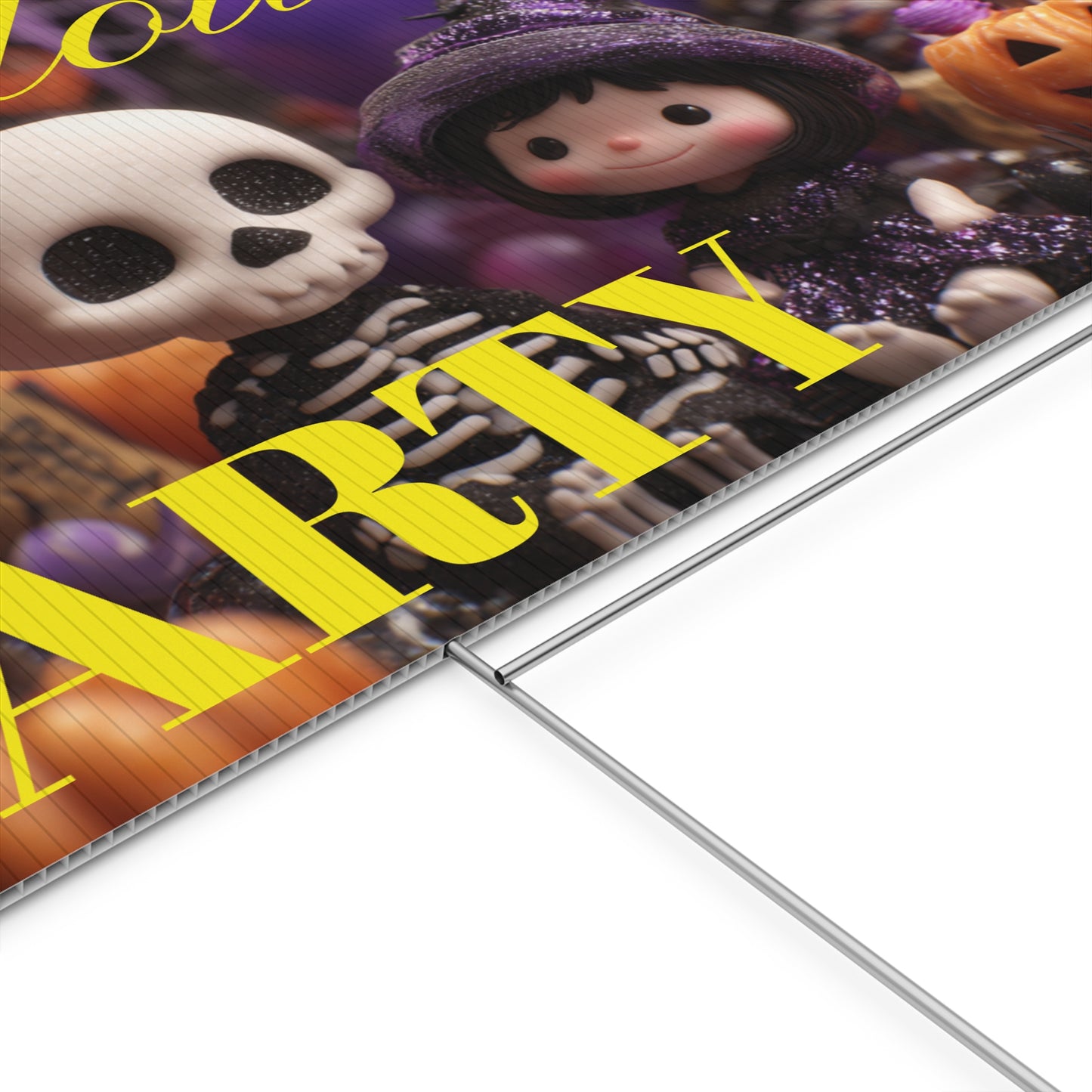 Halloween-themed party sign with cartoon characters on a grassy lawn