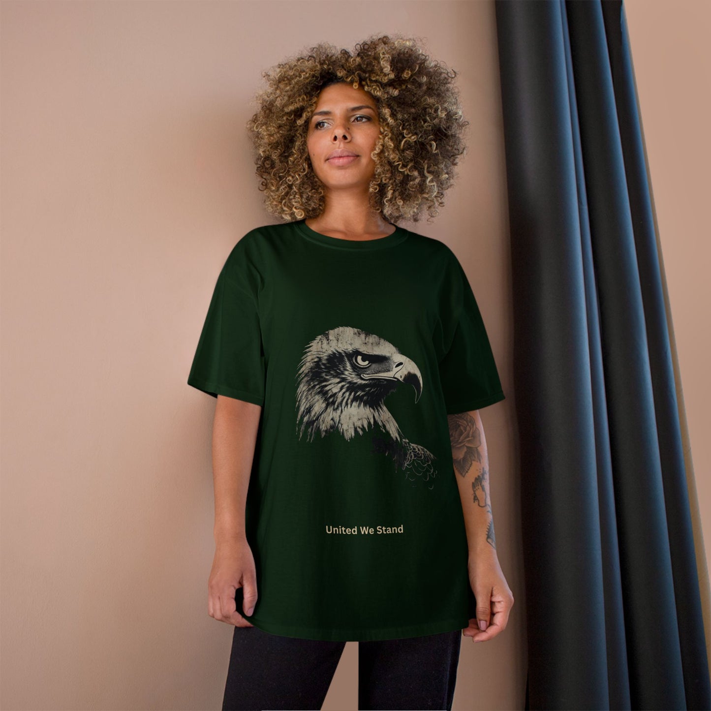United We Stand small font text below an eagle head on a Champion Tee