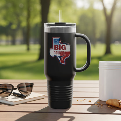 Travel mug with Texas outline and text.