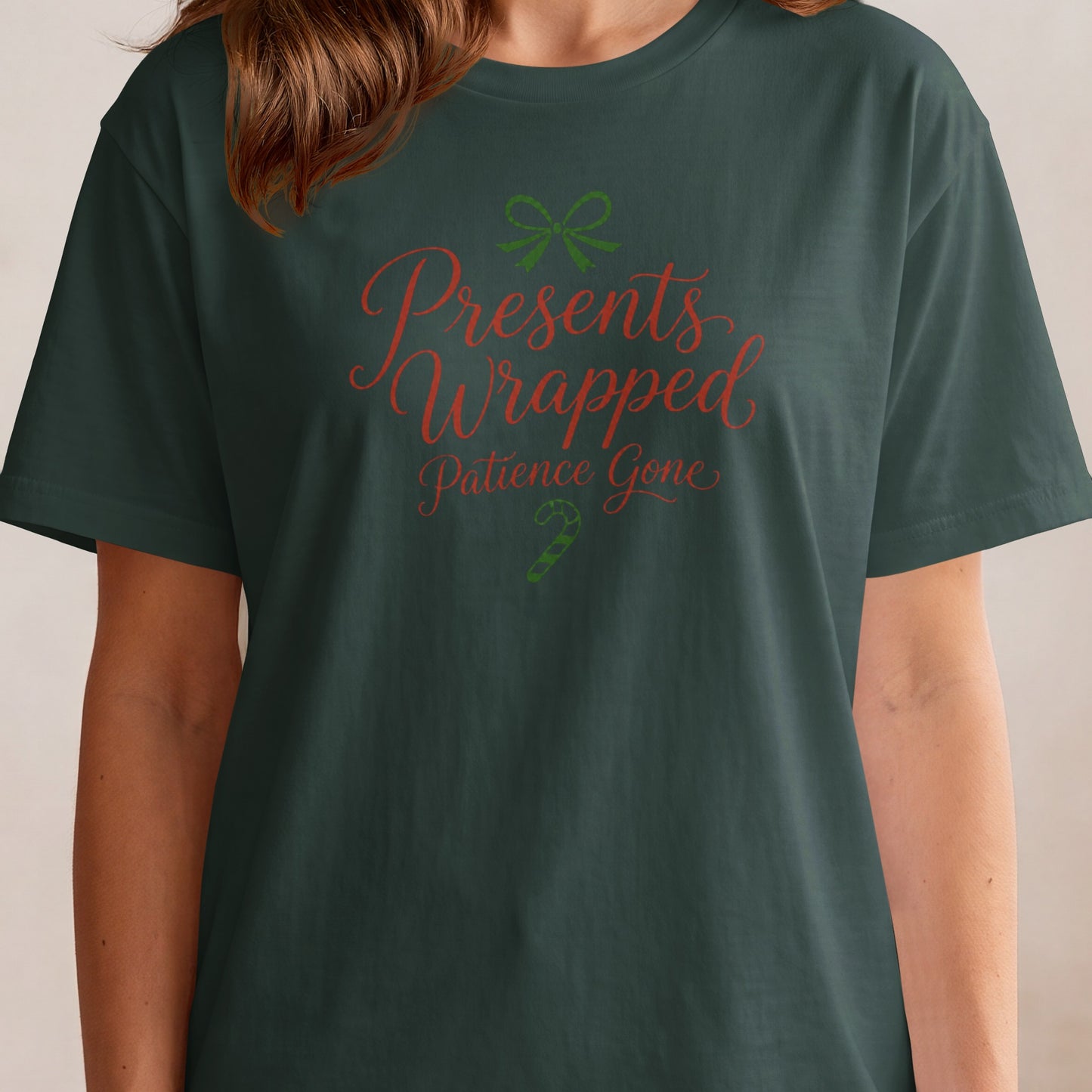 Dark green t-shirt with red text "Presents Wrapped Patience Gone".