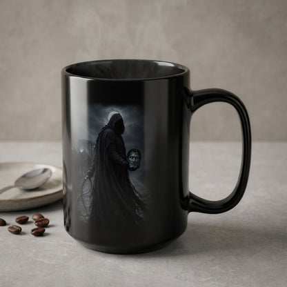 Black mug featuring dark hooded figure holding a severed head.