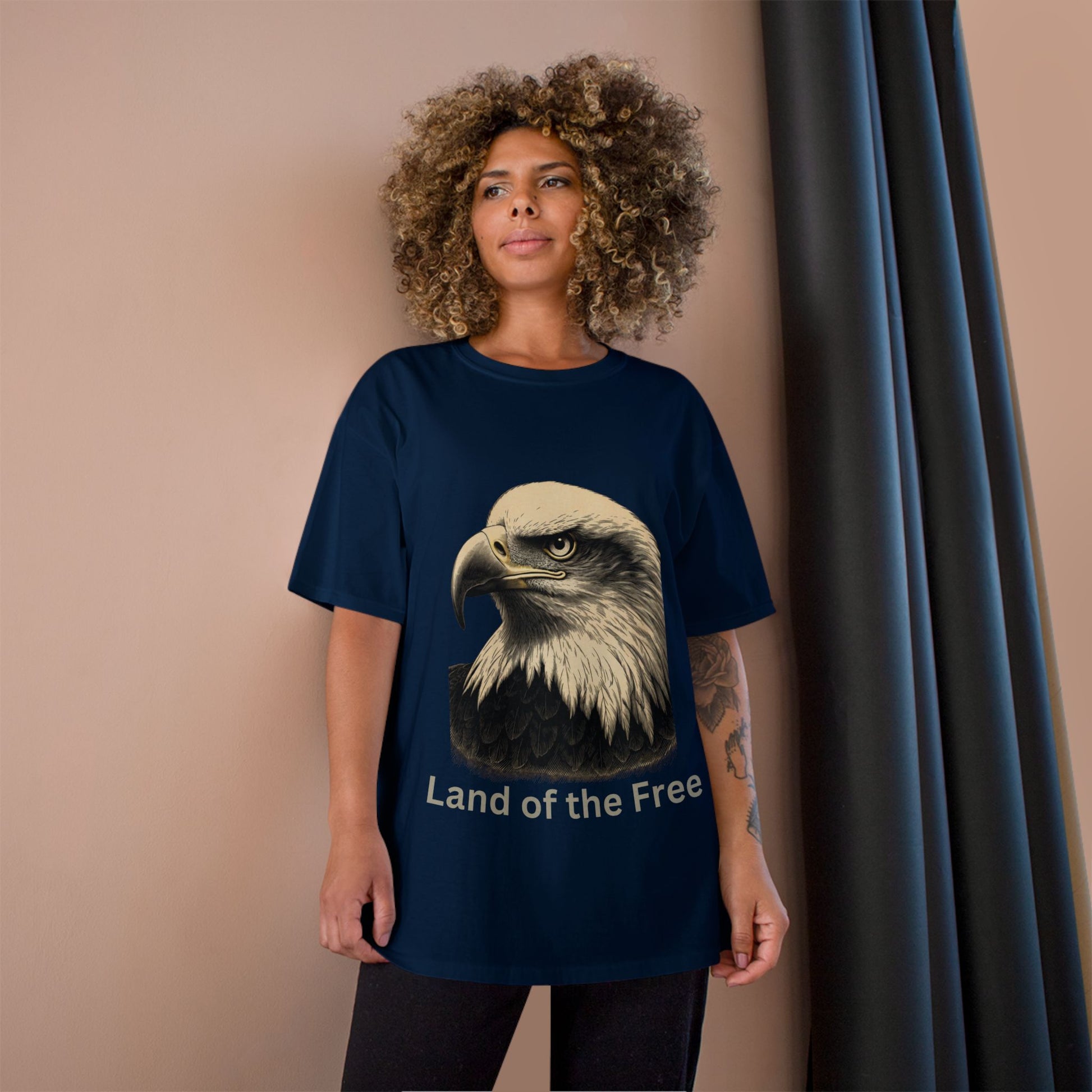 Engraved Eagle - Land of the Free - text on the bottom of a Champion Tee