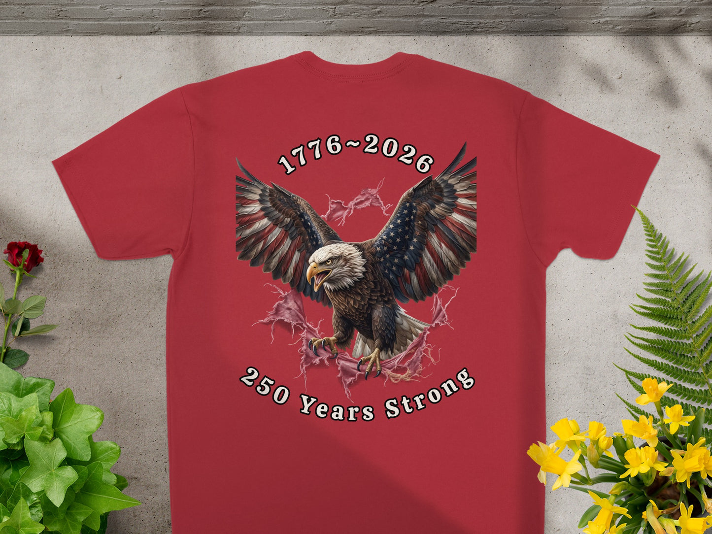 Red t-shirt with an eagle and 1776-2026 250 Years Strong text.