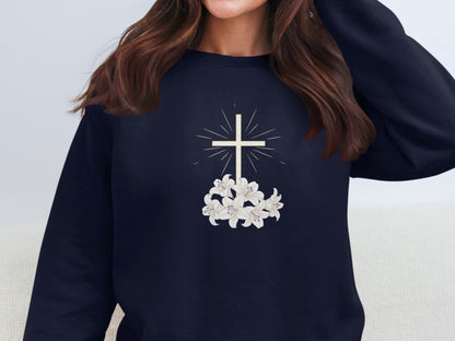 Navy sweatshirt with a white cross and lilies graphic.
