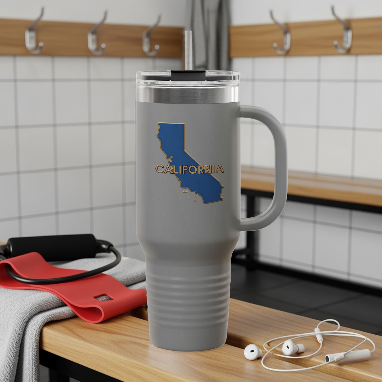 Travel tumbler with Florida Sunshine State logo, outdoors.